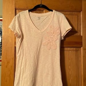 Pink t-shirt with flower embellishment